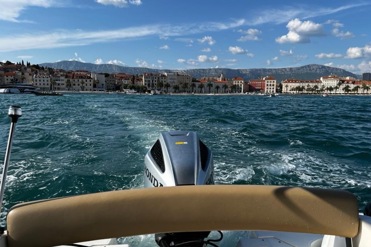Boat tour from Kaštela near Split with view of the Kaštela waterfront and Adriatic Sea