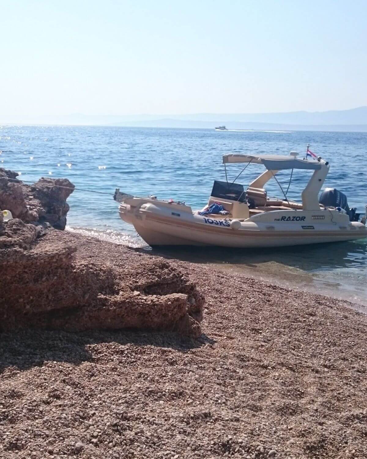 Private boat on beach near Brač Island Croatia